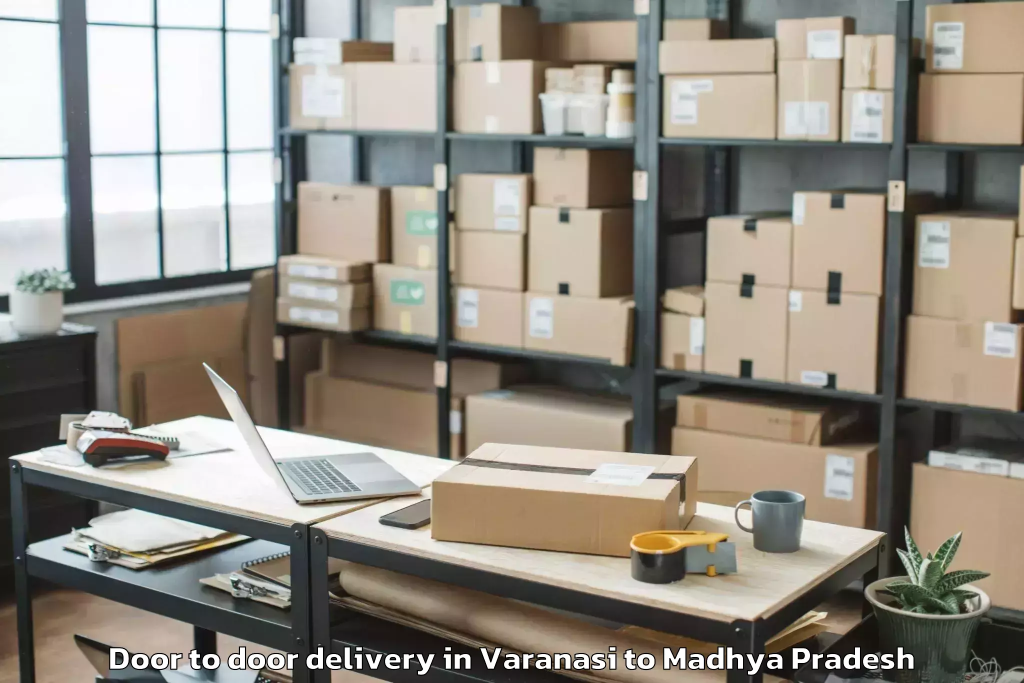 Book Varanasi to Manawar Door To Door Delivery Online